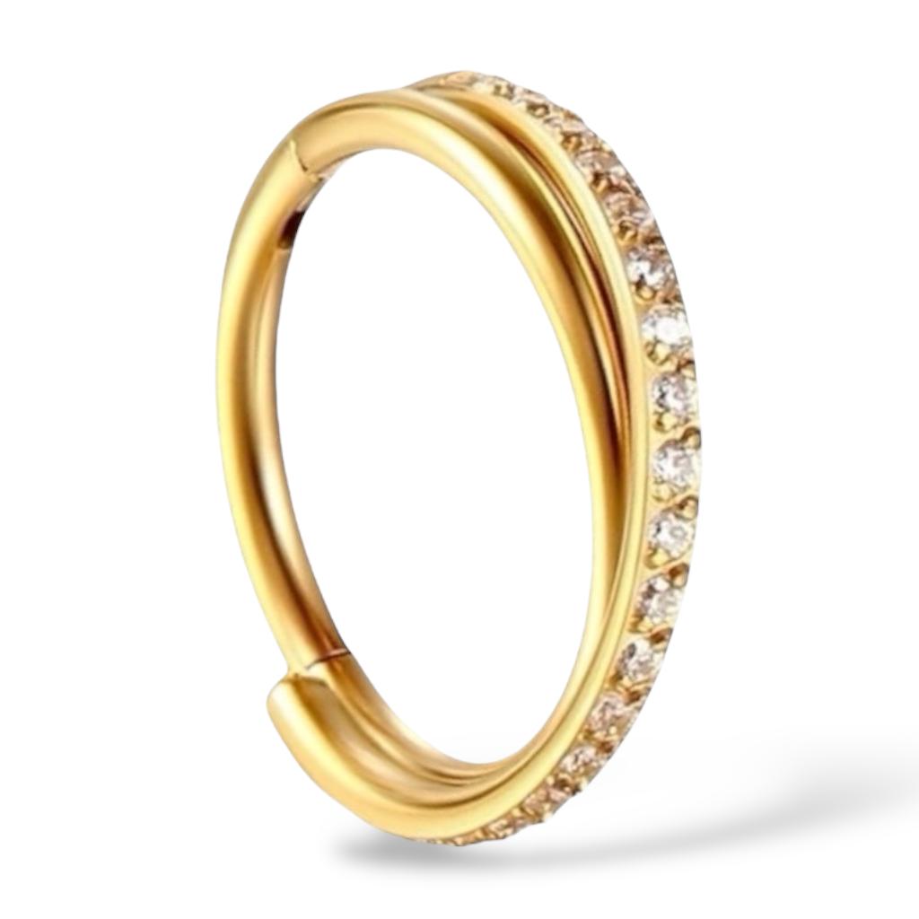 Tytanowy Clicker przeplatany z cyrkoniami.