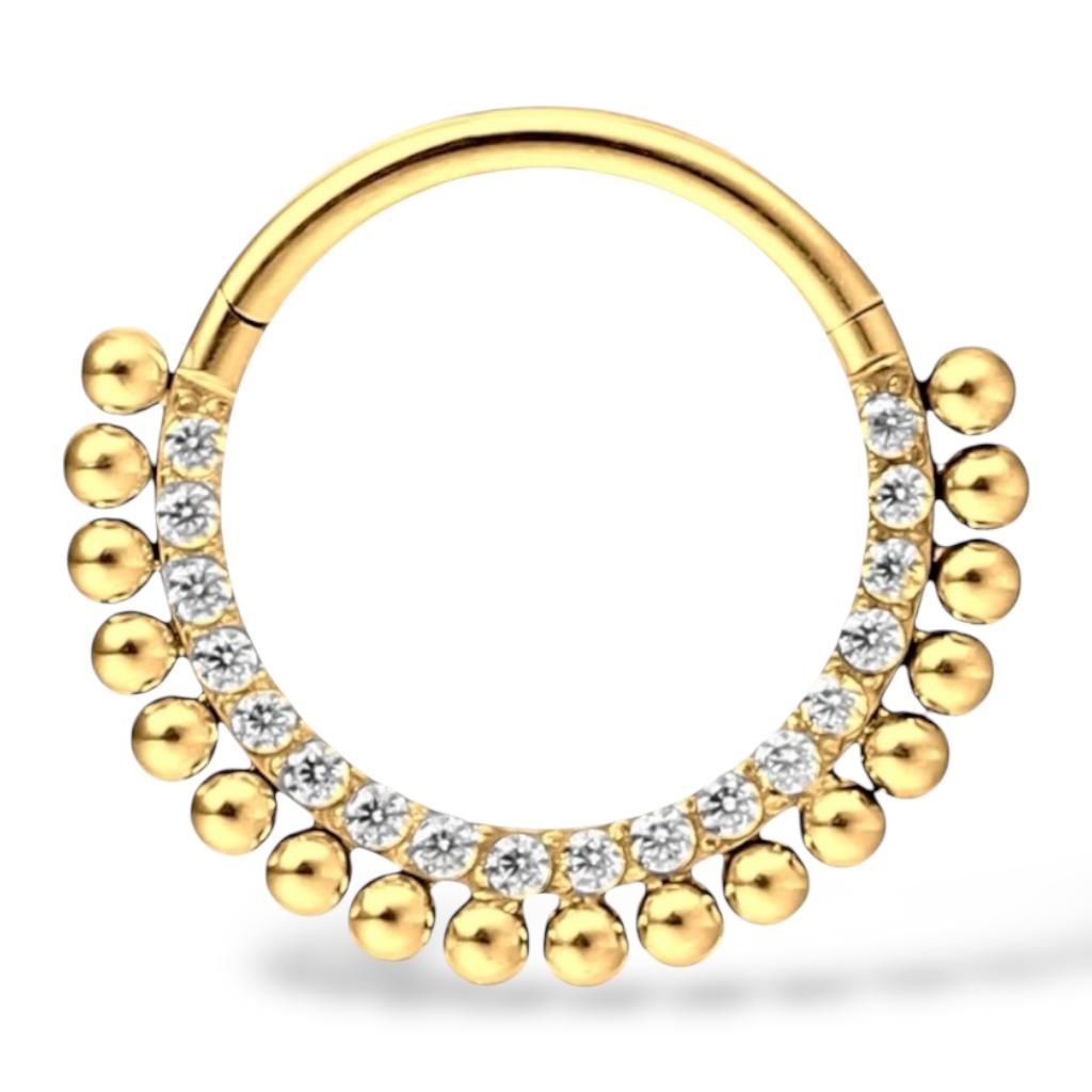 Tytanowy, złoty Clicker z cyrkoniami i kuleczkami.