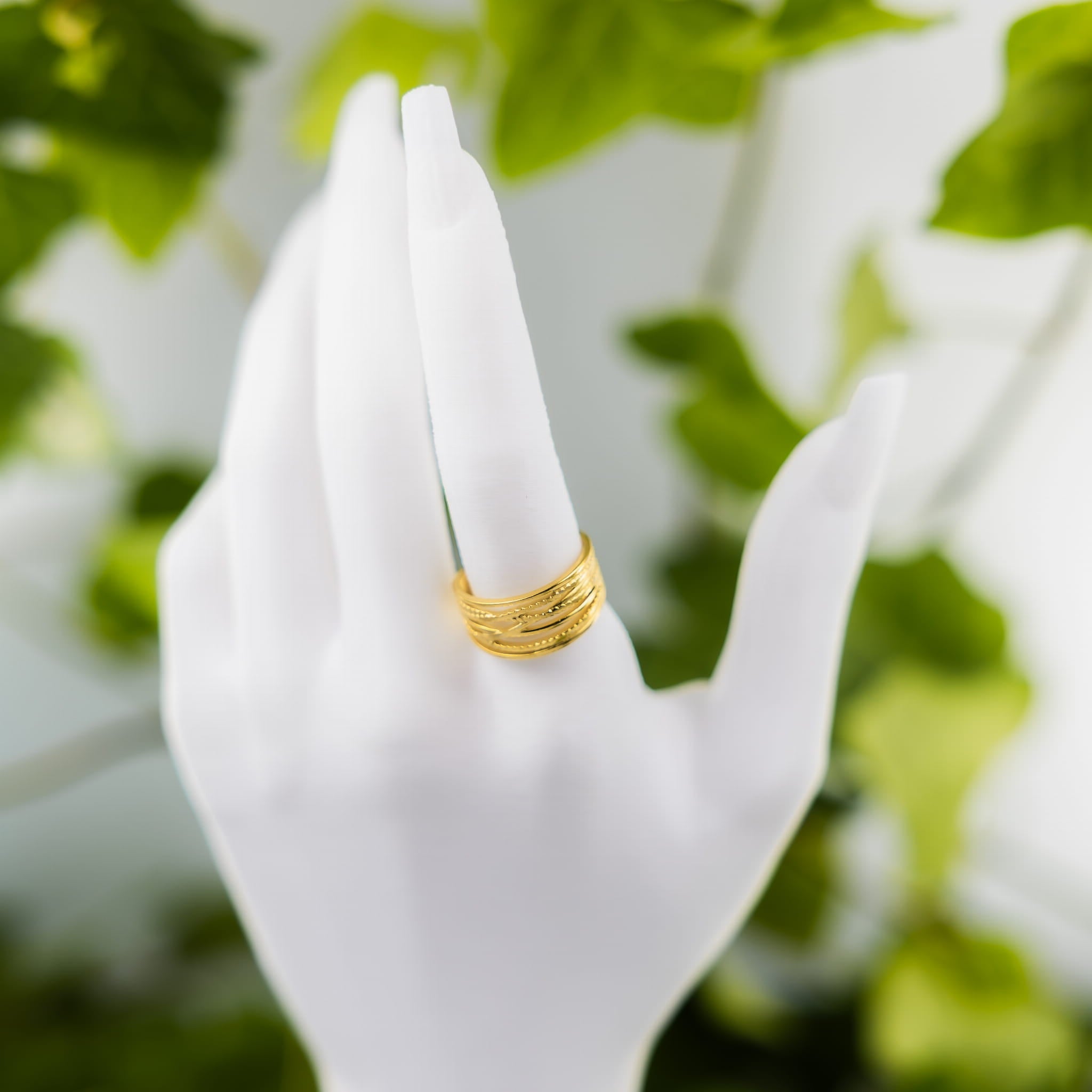 Pierścionek złoty z z plecionym motywem